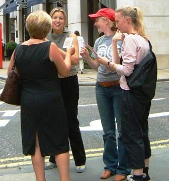 Group discussing a treasure hunt clue.
