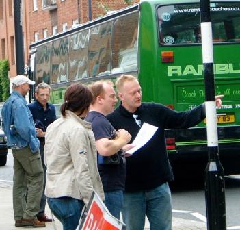 Group on main road searching for a clue.
