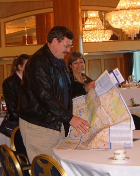 Man studies a map for a Westminster Treasure Hunt.