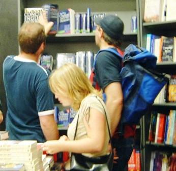 Searching for a clue in a bookshop.