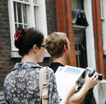 Girl with clue on the Spitalfields Treasure Hunt.