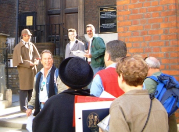 A group meet Sherlock Holmes.