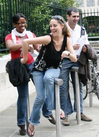 Woman completing a challenge on our Riverside Treasure Hunt.