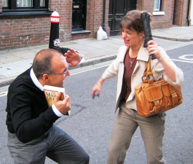 Man and woman posing for a Kensington Treasure Hunt Clue.