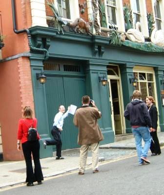 Man chasing a fox as part of the Chelsea treasure hunt challenges.