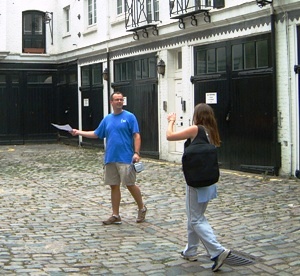 Team discussing where to go next on the Thames treasure hunt.