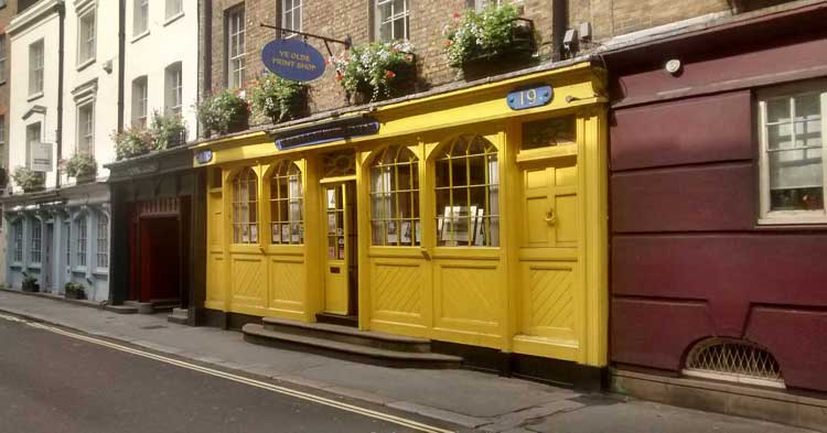 A yellow shop that appears on the Seven Dials Treasure Hunt.