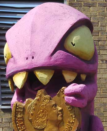 A pink monster eating a coin that features on the Spitalfields quest.