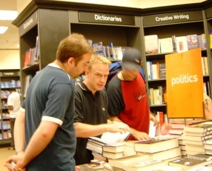 Looking for a treasure hunt clue in a bookshop.