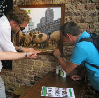 Two men study a clue on their theatreland treasure hunt