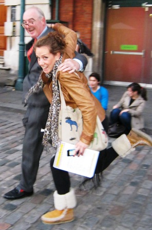 Two people racing to complete the theatreland treasure hunt.