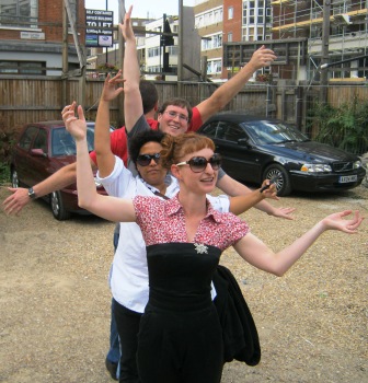 A team accept the challenge of imitating the branches of a tree on the London Theatreland Treasure hunt.