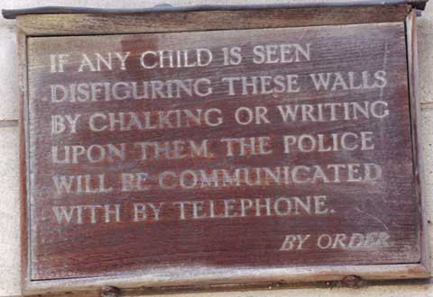 A sign warning against chalking or writing on the wall.