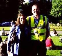 Woman standing next to a person in uniform on the Hampstead Treasure Hunt.
