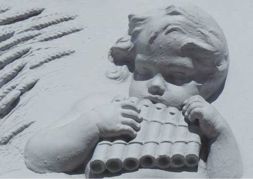 A carved cherub in Belgrave Square.