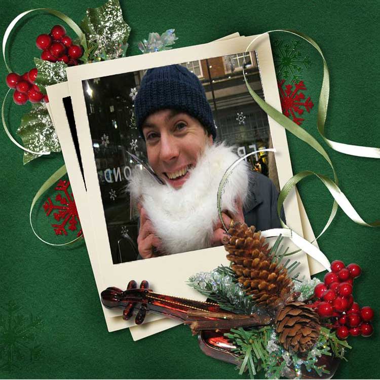 A man posing in a white beard for the Christmas treasure hunt.