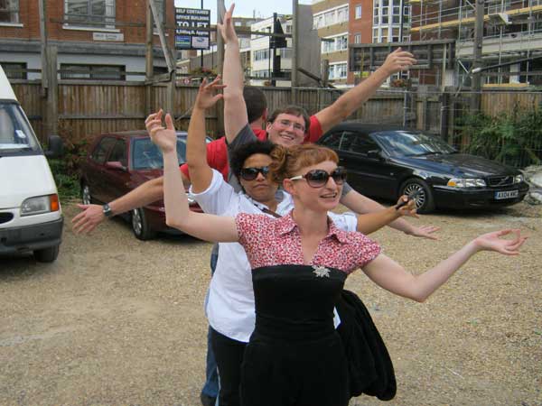 Four team members imitating the spreading branches of a tree on their Clerkenwell quest.