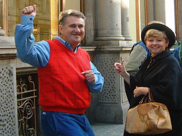 A man and a woman cheer as they reach the end of their treasure hunt.