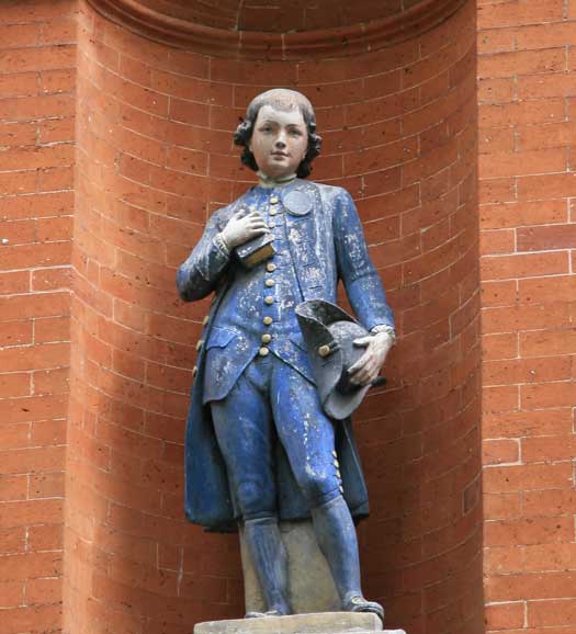 A statue of a charity boy that is featured on our Old Docklands Treasure Hunt.